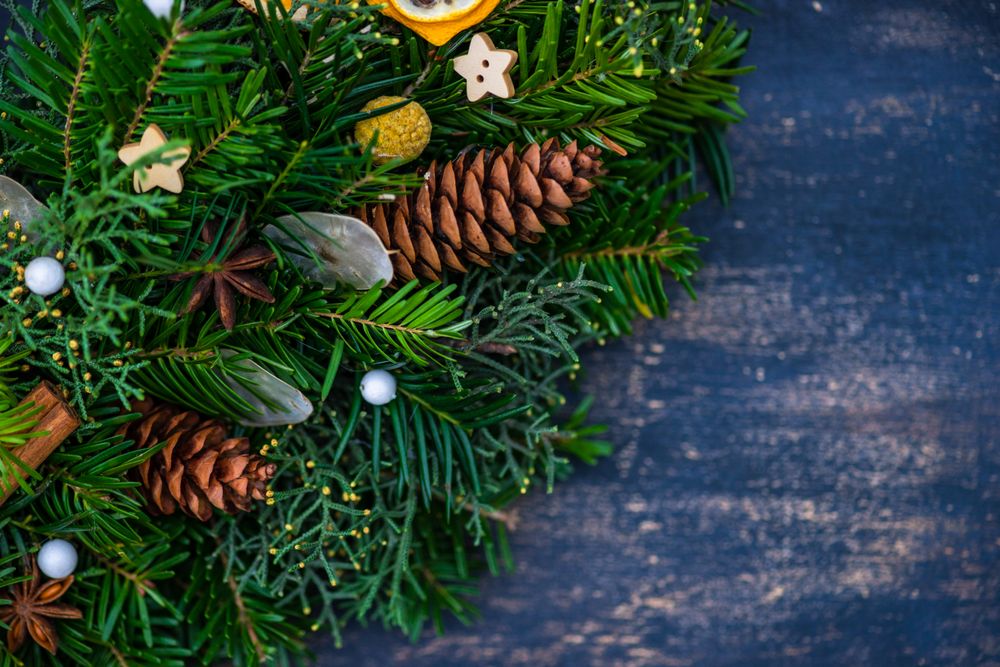 Christmas fir tree wreath with pinecones and spices