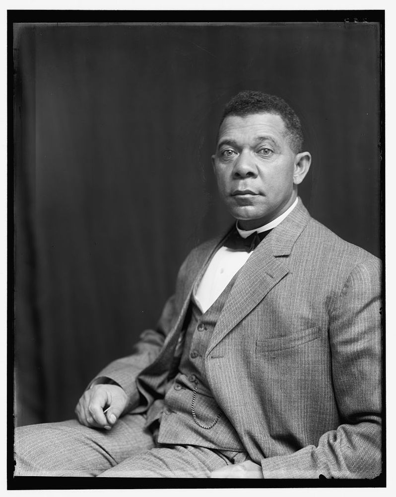 Portrait of Booker T Washington, half-length portrait, seated