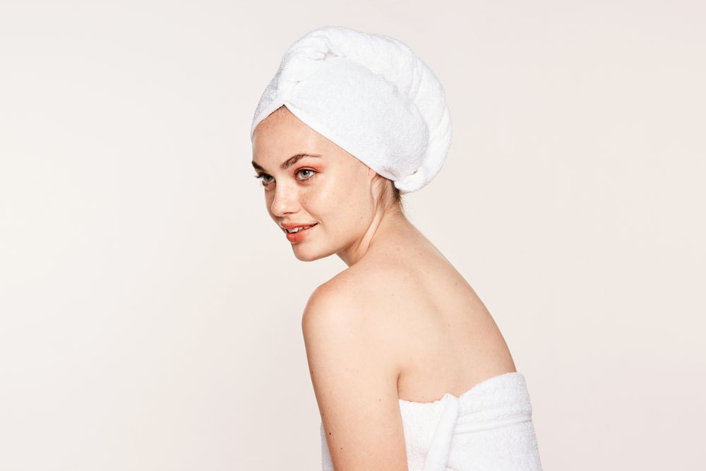 female with radiant body after cosmetic procedure