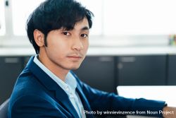 Asian male in suit in his work office 4dQAnb