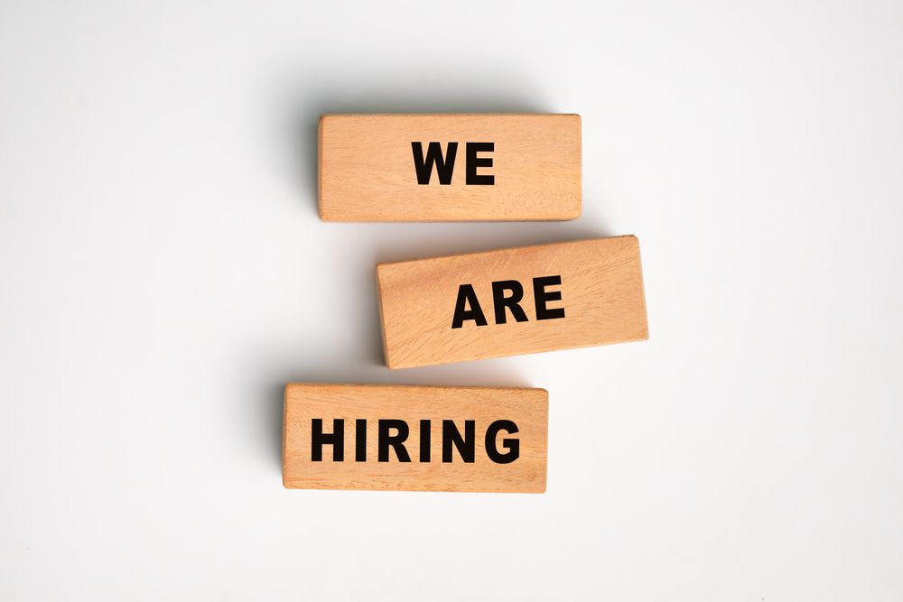 we are hiring words on wooden blocks
