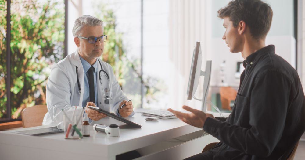 Doctor in Coat Suggesting Treatment to Patient