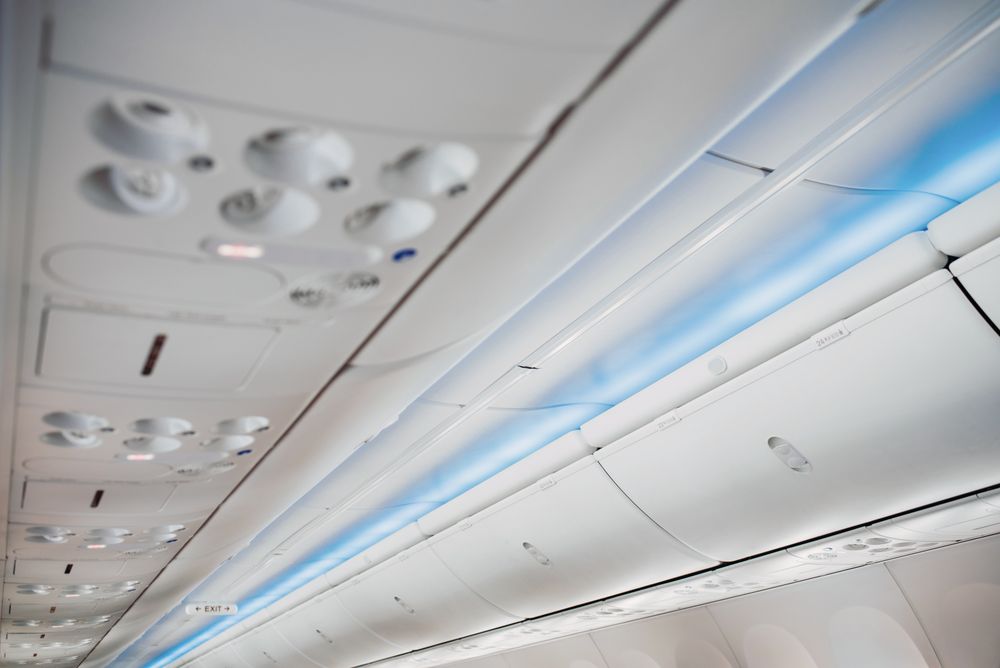 aircraft ceiling compartment with different buttons