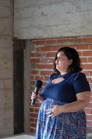 Woman engaging in public speaking