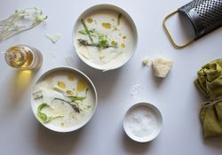 Kitchenware and condiments near asparagus cream soup