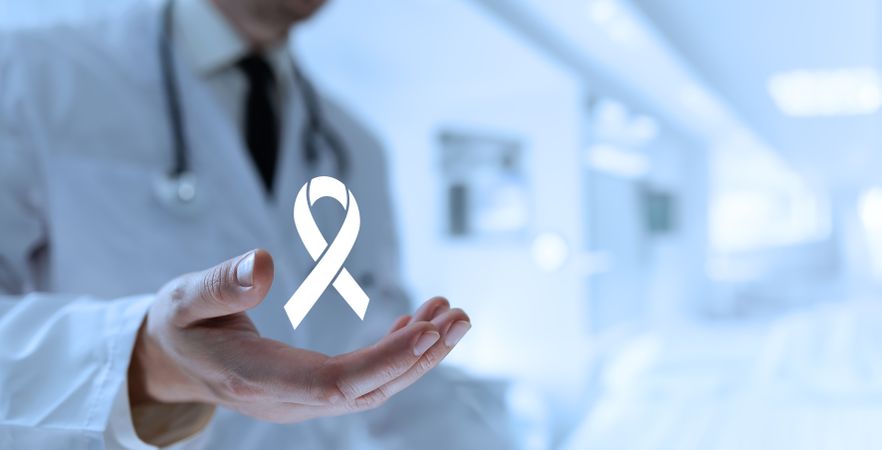 Doctor Reveals Ribbon Icon in Palm