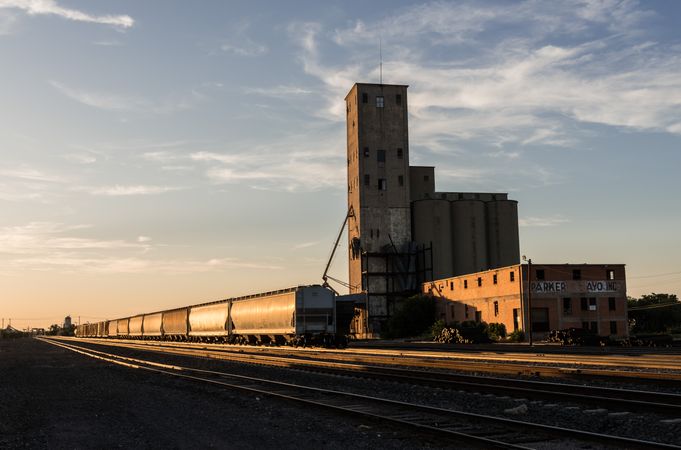 A grain elevator adjoins freight-rail tracks in Wichita Falls, Texas