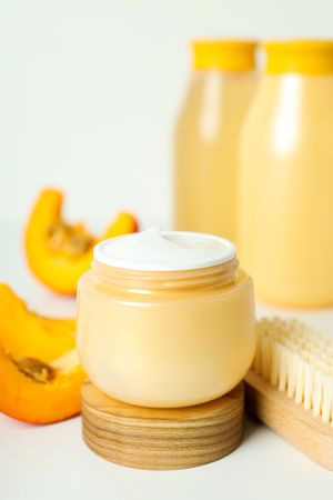 Skin care and face care concept - pumpkin cosmetic