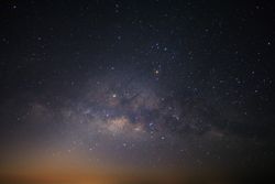 Milky way galaxy with stars and space dust in the universe, Long exposure photograph, with grain.