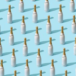 Champagne bottle in rows