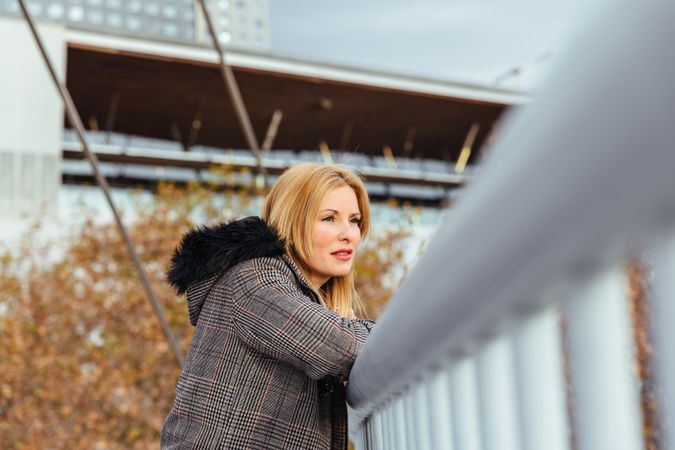 Blonde woman posing in the city