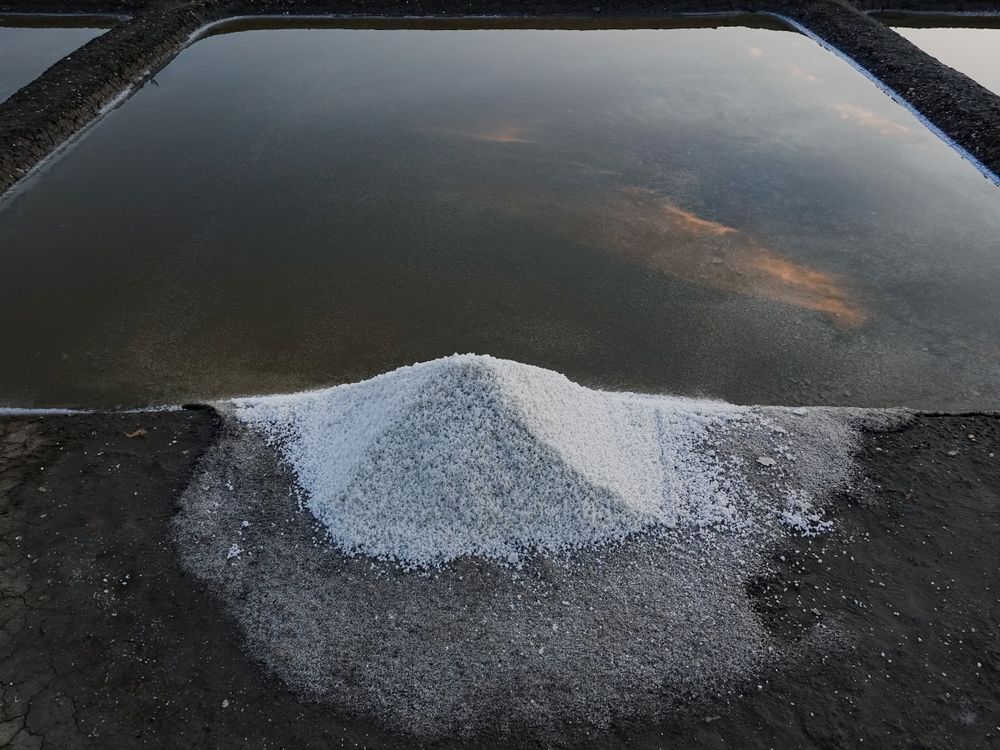 Salt mound on the edge of its salt pan