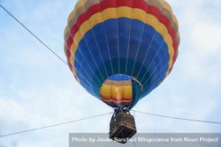 Side view of hot air balloon ascending in Aeroestacion Festival in Guadix, Granada, Andalusia, Spain 5o7ey5