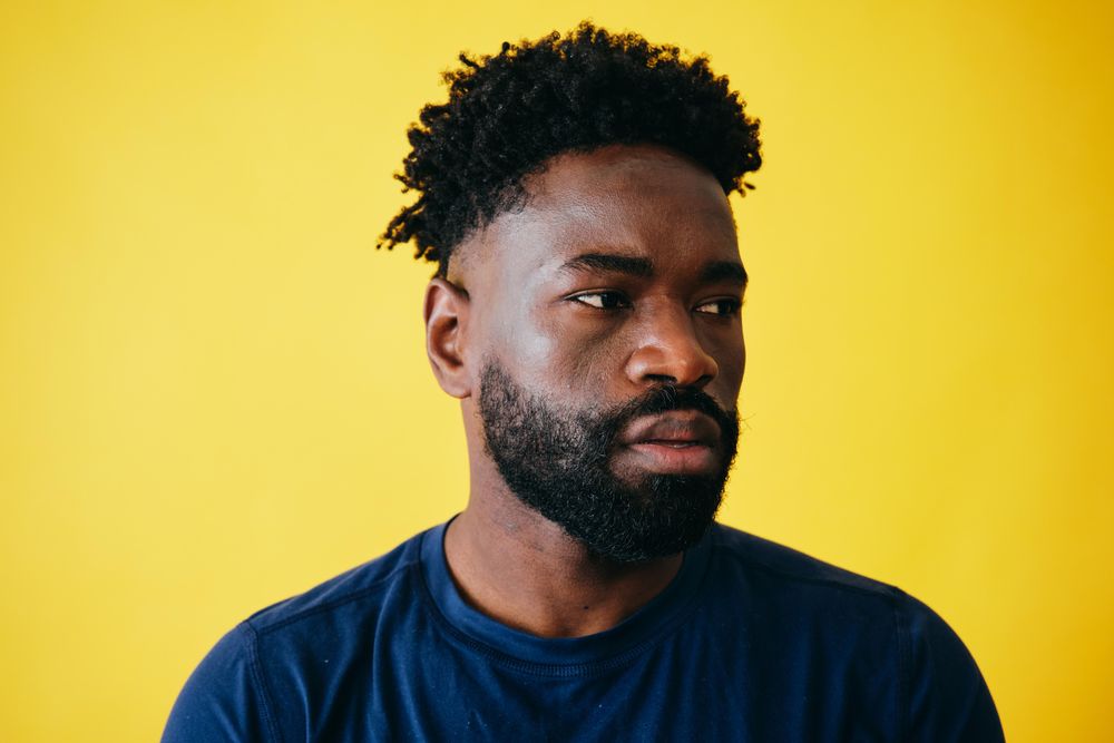 Portrait of serious Black man looking to the side