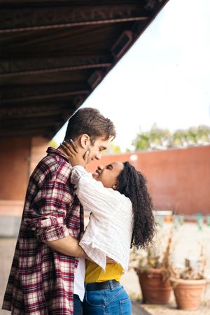 Cute couple meeting at the station after a trip