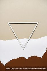 Earthy brown, beige and light torn paper background with triangle frame 42ROm4