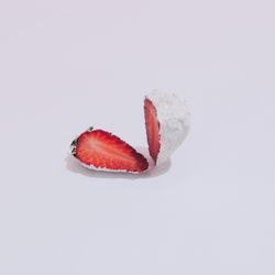 Painted strawberry cut in half