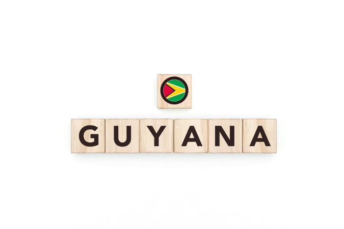Wooden blocks bearing the name and flag of Guyana.