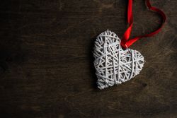 Thatched Valentine's day heart decoration on wooden table