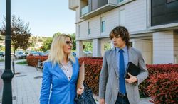 Businesspeople walking down the street