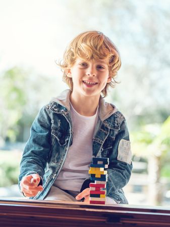Happy child playing in backyard