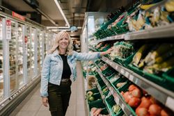 Mature woman in the produce aisle