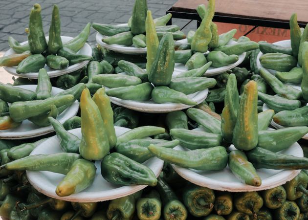 Plates of green peppers for sale in Oaxaca