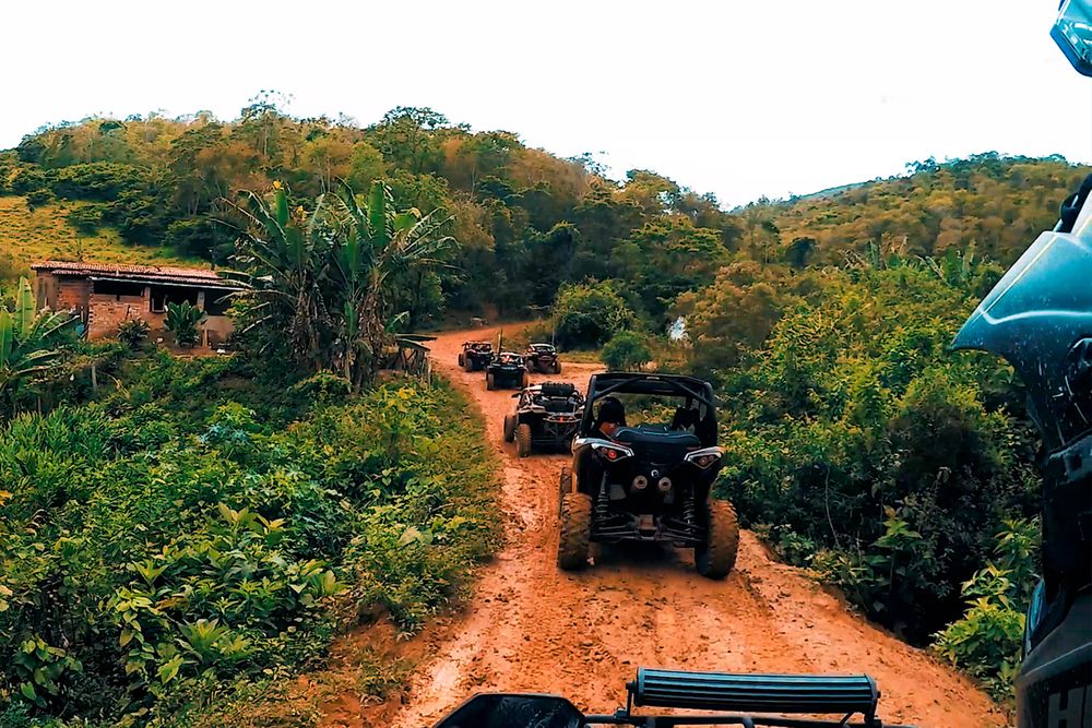 Off-road vehicles on dirt pathway