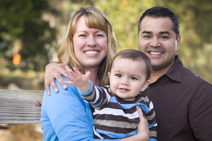 Happy Family Posing for A Portrait