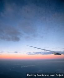 Airplane wing under blue sky during sunset bY6Dg0