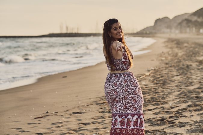 Woman with dress at the beach