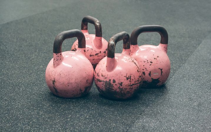 Kettlebells on the floor of a gym