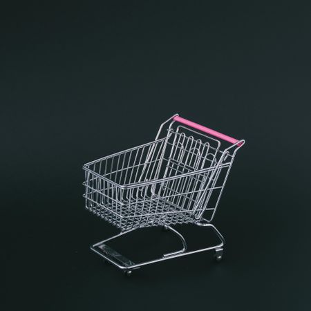 Shopping cart on dark background