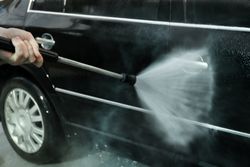 A man washes a car. Clear car concept