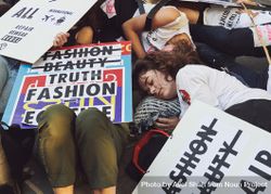 London, England, United Kingdom - September 15th,2019: Protesters lying huddled together with signs 0yXGRb
