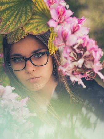 Woman on background of stunning violet flowers
