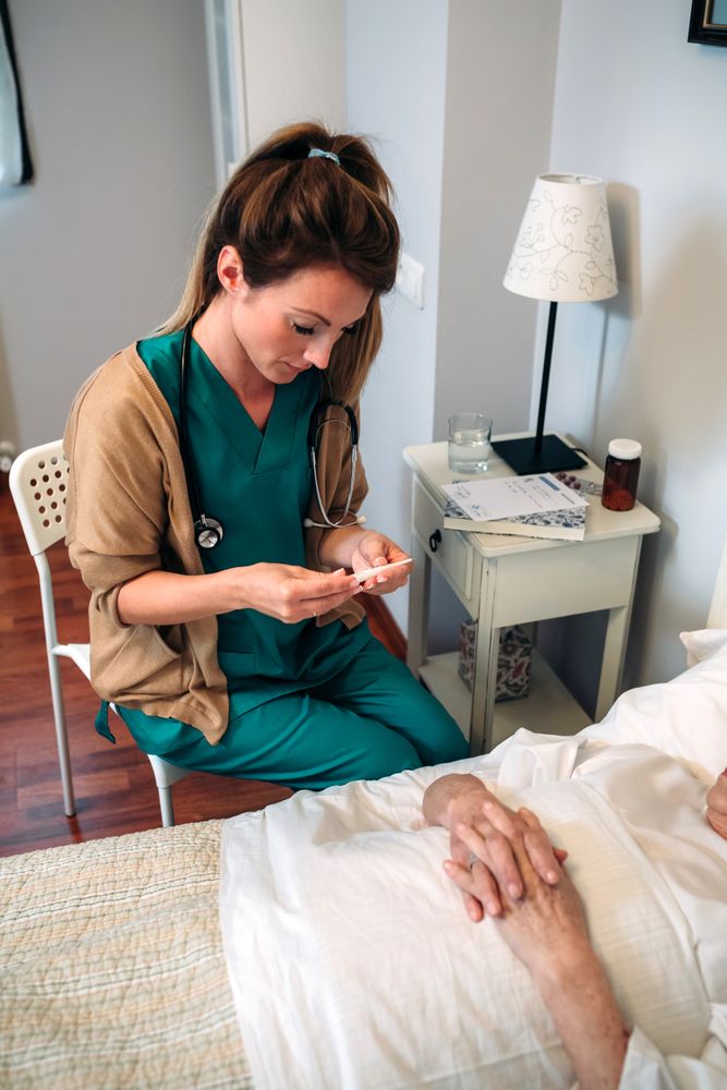 Doctor taking temperature to woman
