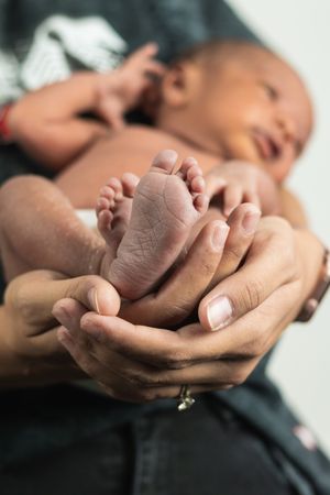 Newborn baby on soft blanket