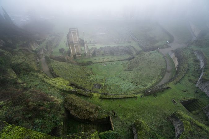 Majestic view of ancient ruins in fog