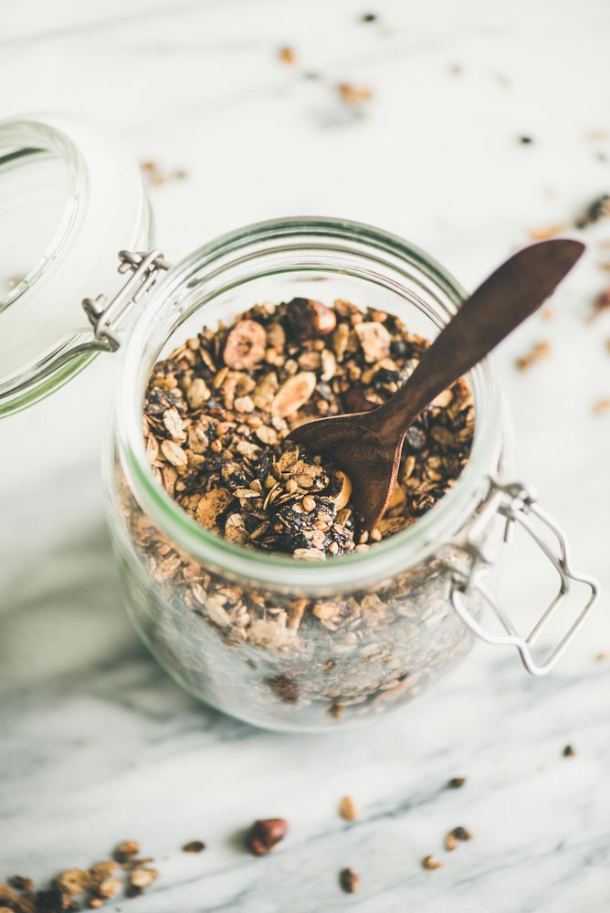 Top view glass container of homemade granola