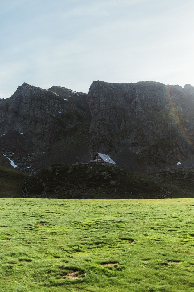 Picturesque view of small house in mountains