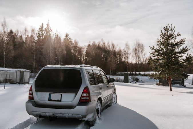 Car driving on snow field