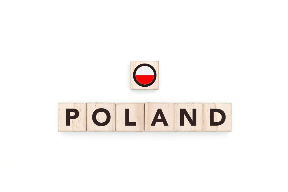 Wooden blocks bearing the name and flag of Poland.