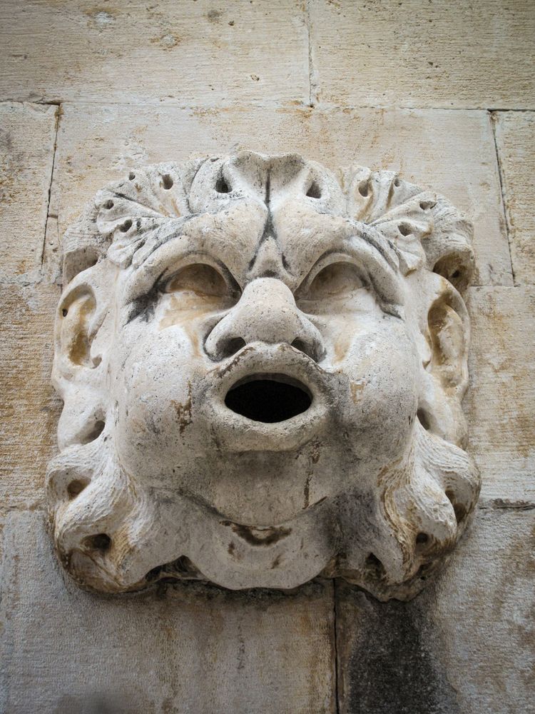 Head of blowing gargoyle