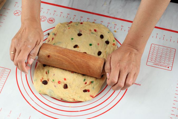 Woman Hand Rolling Fruit Bread Christmas Bread Dough