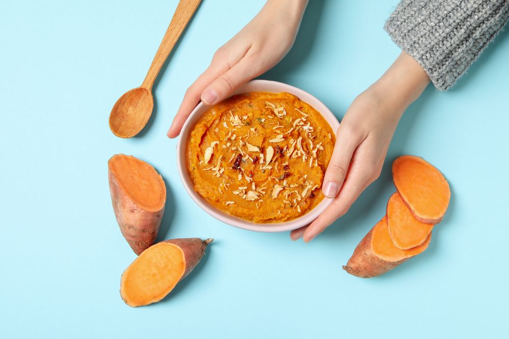 Concept of tasty food, sweet potato puree, top view