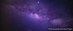 Wide shot of Milky Way with purple sky 4O1nL0