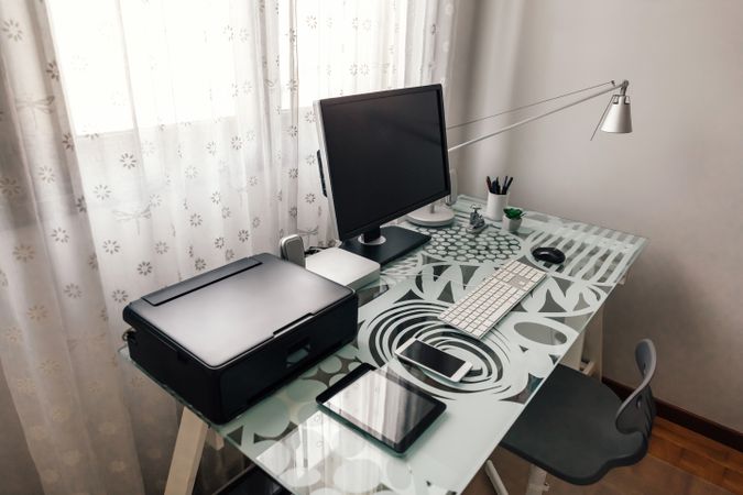 Workstation with table, chair, computer and printer