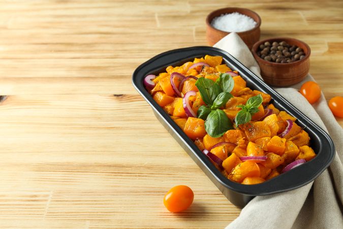 Concept of tasty homemade dish - baked pumpkin