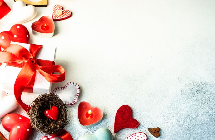 Valentine's flat lay with heart decorations, candles and gifts